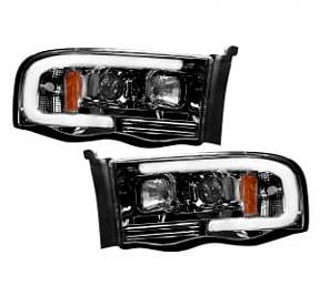 Dodge RAM 02-05 1500/2500/3500 PROJECTOR HEADLIGHTS w/ Ultra High Power Smooth OLED HALOS & DRL - Smoked / Black